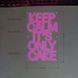 Neon in bar "Keep calm it's only cake"