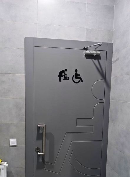 Universal symbol child care room ISO 7001 in black acrylic, nursery or baby care sign. 3D, toilet, modern, minimalist, restaurant, hotel door sign - self-adhesive